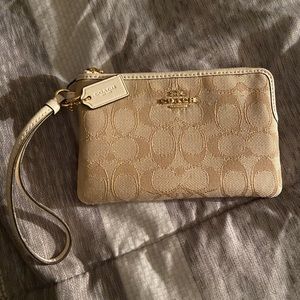 New never used coach wristlet still have box.